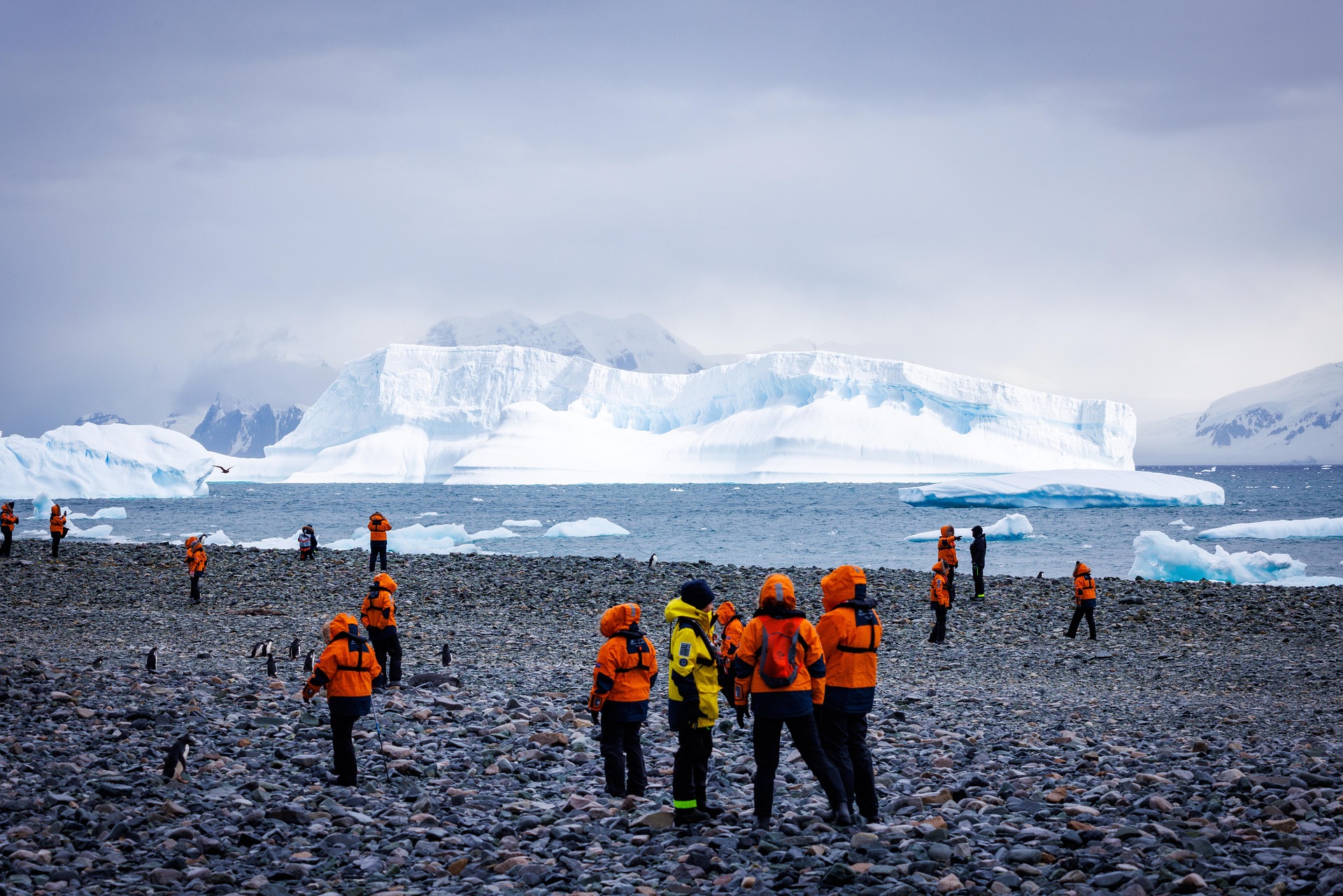 Premium expedition cruise ship surrounded by glaciers in Antarctica
